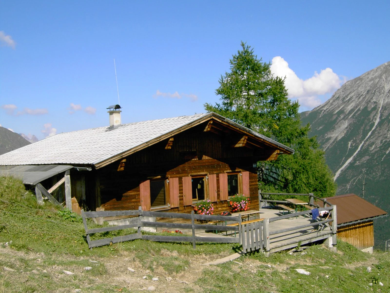 Traditional alpine pasture with wooden hut in the Lechtal mountains